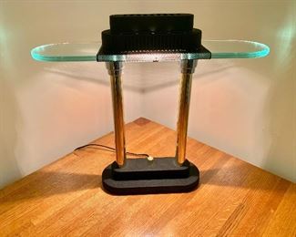 $75  Contemporary black, glass, brass table lamp, 15" H x 17.5" W x 4.5" D.