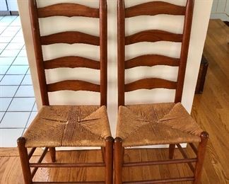 $195  Pair ladder back rush chairs.   42" H, 18" W, 14" D, seat height 17.5".  