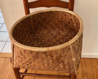$45 Hand woven basket.  8.5" H, 18" diam. 