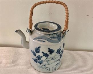 $90   Blue and white teapot #1 slight crack.  9" H, 6.5" W, body 5" diam. 