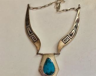$130 Turquoise and silver necklace hallmarked.  Size: chain: 18.5"; pendant: 2"L