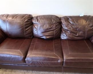 #4- Ashley's Furniture Leather with Nail Head Detail $500.00 - 94x38x29