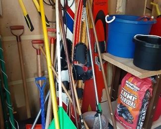 Vintage water skis and garden tools