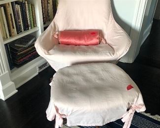 Fabulous Mid Century Modern Swivel Chair & Ottoman, with its pink slipcover