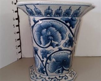 Blue and White Ceramic Vase Has Cracks That Have Been Repaired
