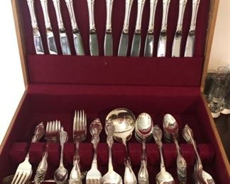 Three sets of flatware 