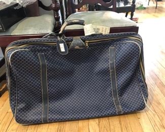 Very well traveled Gucci luggage 