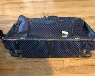 Very well traveled Gucci luggage 