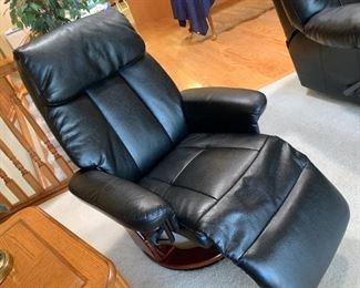 Black "leather" comfort to lean into.