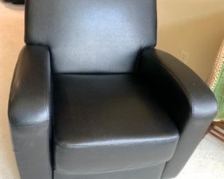 Another wonderful black leather chair. Solid and comfortable.