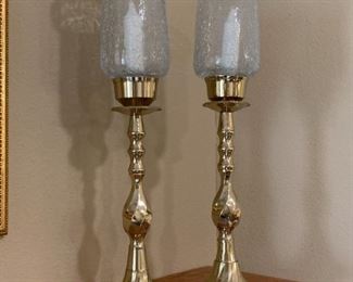 Beautiful brass and crackle glass candleabras.