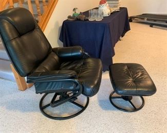 Classic leather chair and ottoman.