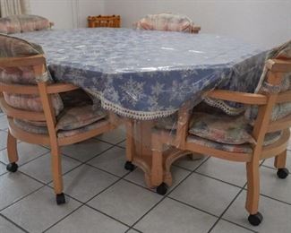Solid oak dining table and chairs