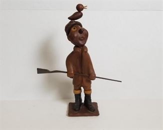 wood carved hunter figure 
