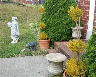 Goddess statue, pair urns, topiaries