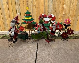 Holiday metal yard art = Santa & The Grinch on a bike, Christmas Tree, Candy Canes, Poinsettias & single Santa