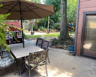 Stone top outside table w/umbrella w/6 chairs