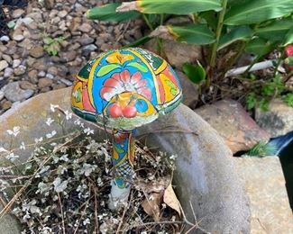 Colorful mushroom yard art