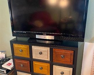 Vizio flat screen TV - NOT sold
Fun & "mod" 9 drawer dressor = SOLD