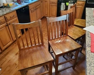 Set of four solid oak bar stools