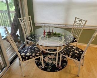 Heavy duty glass top dining room table very good condition