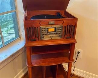 Spirit of St. Louis Vintage Radio and Record Player with stand
Like new condition!
Has CD, Tape, Radio and Record Player options.
Has remote as well.
Measures: 18” across x 14” deep x 36” tall.