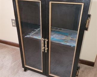 $35.00, 31 x 22" wide,  Black lacquer glass front cabinet