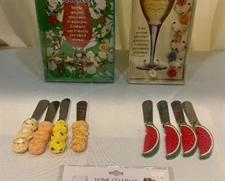 #1121C - Wine charms (front) - $2
#1123C - Set of 4 bakery cheese knives  - $2
#1122C - Set of 4 watermelon cheese knives - $2
#1119C - Bali Hai wine charms set of 12 - $4 (back left)
#1120C - Wine markers $2 (back right) 
