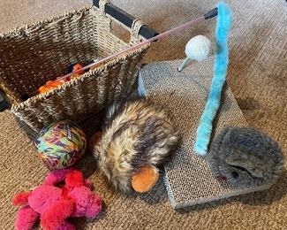 #1186G - Basket of assorted cat toys and scratcher - $8
