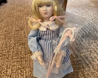 #1236G - Doll with porcelain face - $10 (2 available)