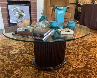 #1328A  oval based coffee table with beveled glass top $75