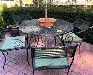 Wrought iron table and 4 chairs