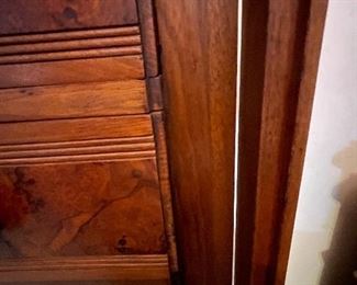 #16 - $650 • 19thcentury American transitional mahogany and burlwood 7-drawer locking tall privacy chest • locking mechanism • unusual back carving