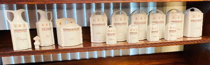 #31- $80 • 1940s German canister set   • 17 pieces • one stopper  missing on the vinegar	