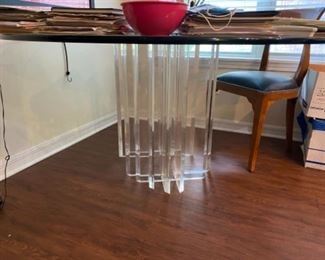$650 •  Sculptural Lucite base round 52” table with ¾” glass top  • 60"D x 30"H - glass 3/4" thick