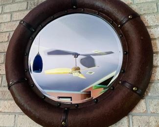 $70  Leather tooled nautical mirror  • 35across