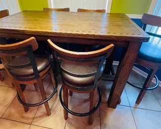 Ashley Drewing Brown Rustic Hightop  bar heights table and six hightop swivel chairs $695 