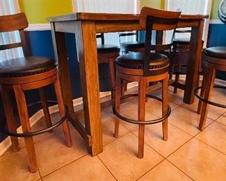 Ashley Drewing Brown Rustic Hightop  bar heights table and six hightop swivel chairs $695 