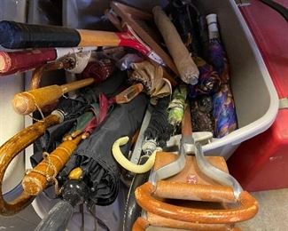Lots of umbrellas and canes