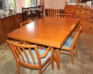 dining table and six. chairs, plus one 12" leaf and table protectors