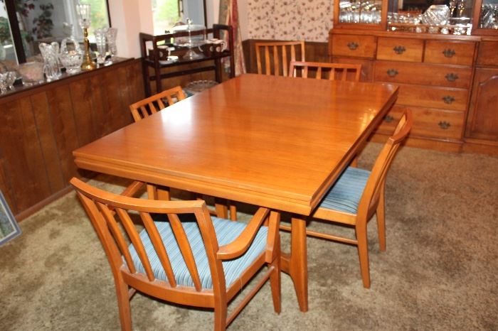dining table and six. chairs, plus one 12" leaf and table protectors