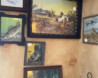 Many Framed Pieces of Art