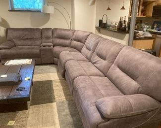 Sectional sofa with electric reclining