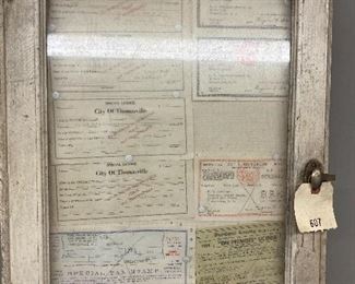 Old Hanging Cabinet with Vintage Thomasville Business Licenses