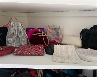 Many purses, women’s clothing and shoes.