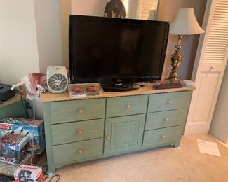 Bedroom dressers and flatscreen T.V