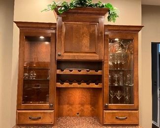 Custom made cherry stained lighted  2 piece wood hutch by Taylormade in Naperville - measuring 58" wide x 25" deep x 36" high. Top piece is 53" high. 