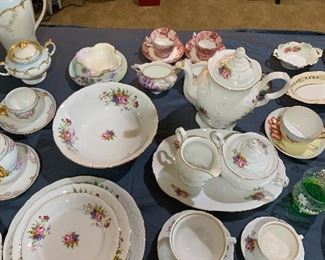 Set of china -one place setting shown, rest packed