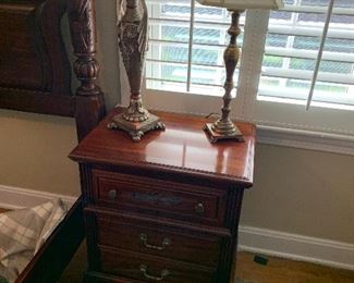 Pair of tables, pair of lamps, pair of candles