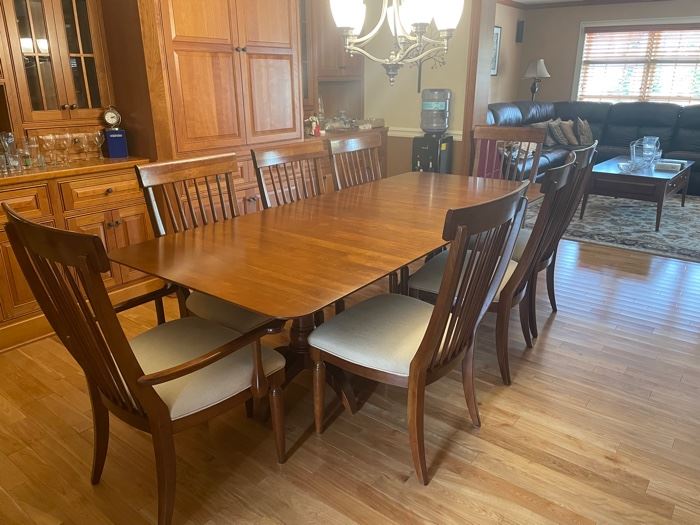 Kincaid dining set with 8 chairs and 2 removable leafs. Measures 75"x42"x30" and each leaf adds 20".